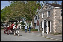 Horse carriage and bank building. Mystic, Connecticut, USA