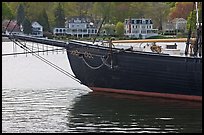 LA Dunton schooner and houses across the Mystic River. Mystic, Connecticut, USA