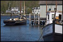 Historic boats, Mystic River, and houses. Mystic, Connecticut, USA (color)