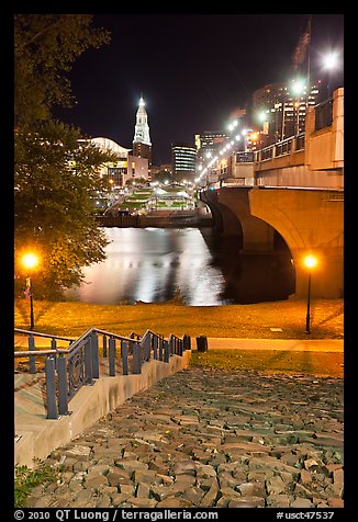 Quay by Connecticut River and nighttime skyline. Hartford, Connecticut, USA