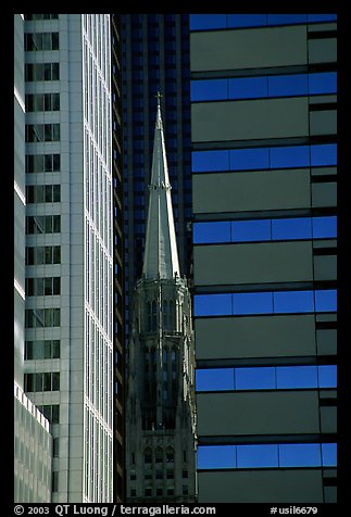 Church spire and modern buildings. Chicago, Illinois, USA