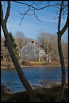 Historic house next to pond, Sandwich. Cape Cod, Massachussets, USA (color)