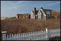 Fence and cottages in winter, Truro. Cape Cod, Massachussets, USA