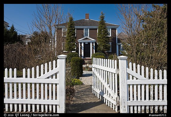 White picket fence and house, Provincetown. Cape Cod, Massachussets, USA