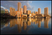 Boston skyline from harbor, sunrise. Boston, Massachussets, USA
