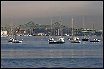 Harbor with anchored boats and bridge. Boston, Massachussets, USA