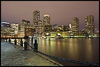 Night skyline above harbor. Boston, Massachussets, USA