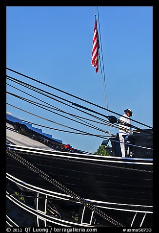 Sailor and flag on USS Constitution (9/11 10th anniversary). Boston, Massachussets, USA (color)