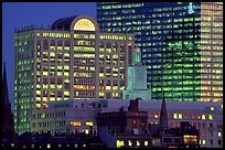 Old churches and modern glass buildings at dusk. Boston, Massachussets, USA