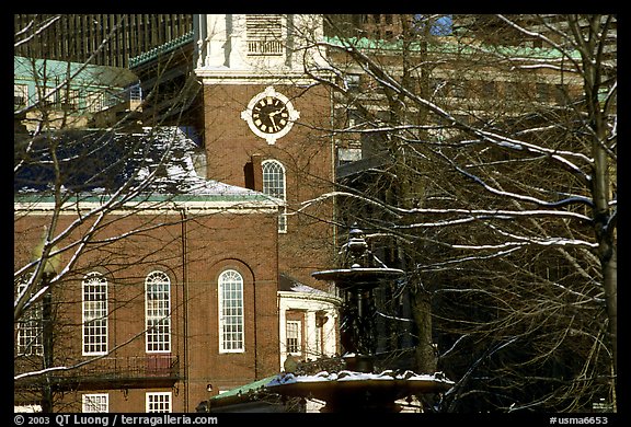 Historic church and snow covered branches. Boston, Massachussets, USA