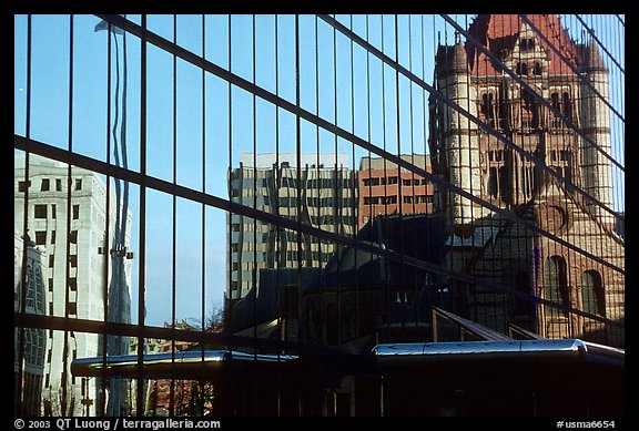 Historic church reflected in a modern glass building. Boston, Massachussets, USA (color)