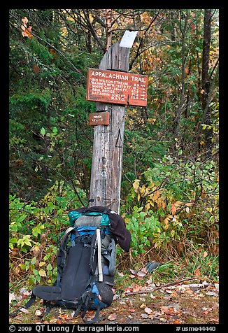 Backpack and marker for last 100 miles, wildest of Appalachian trail. Maine, USA (color)