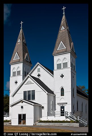 White church with double bell towers, Greenville. Maine, USA