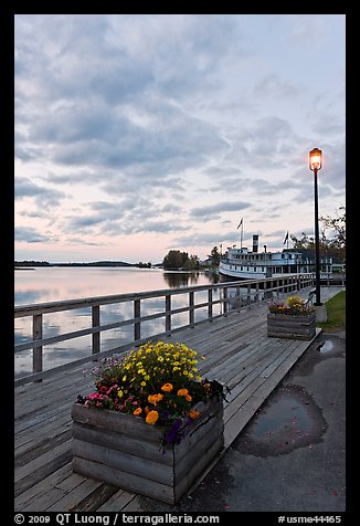 Deck, lamp, and Katahdin steamer at sunset, Greenville. Maine, USA (color)