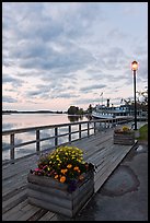 Deck, lamp, and Katahdin steamer at sunset, Greenville. Maine, USA ( color)