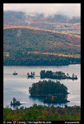 Islets and mountain slopes with fall foliage. Maine, USA (color)