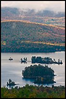 Islets and mountain slopes with fall foliage. Maine, USA (color)