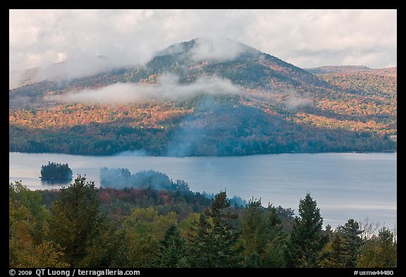 Autumn scenery with lake and clouds lifting up. Maine, USA (color)