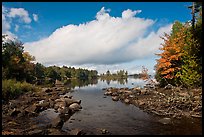 Stream, trees in fall color, Beaver Cove. Maine, USA