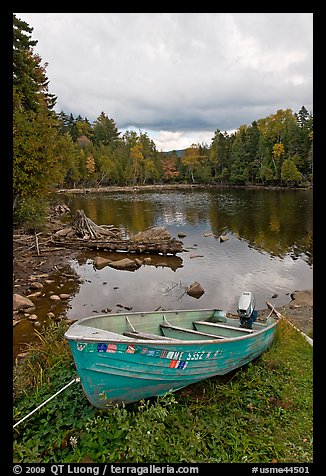 Small boat and cove, Lily Bay State Park. Maine, USA (color)