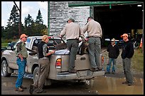 Game wardens check antler length of killed moose, Kokadjo. Maine, USA