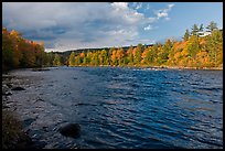 Fast-flowing Penobscot River and fall foliage. Maine, USA ( color)