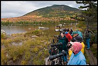 Photographers waiting for moose, Sandy Stream Pond. Baxter State Park, Maine, USA (color)