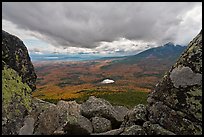 Mountain scenery in fall seen between boulders. Baxter State Park, Maine, USA