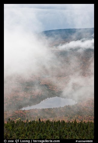 Clouds parting above Sandy Stream Pond. Baxter State Park, Maine, USA (color)