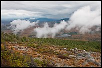 Autumn landscape with clouds hovering below mountains. Baxter State Park, Maine, USA