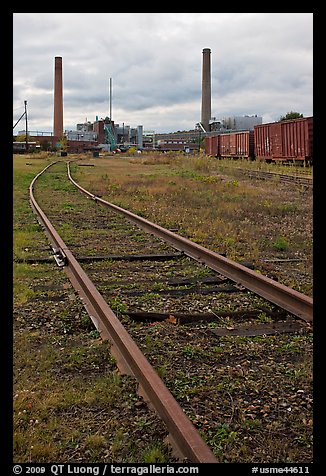 Railroad tracks and smokestacks, Millinocket. Maine, USA (color)