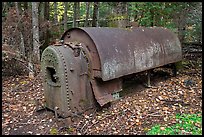 Steam engine remnant in forest. Allagash Wilderness Waterway, Maine, USA