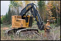 Tracked forest harvester. Maine, USA
