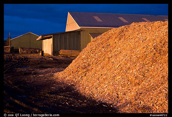 Sawdust in lumber mill at night, Ashland. Maine, USA