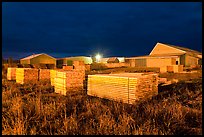 Lumber stacks at night, Ashland. Maine, USA