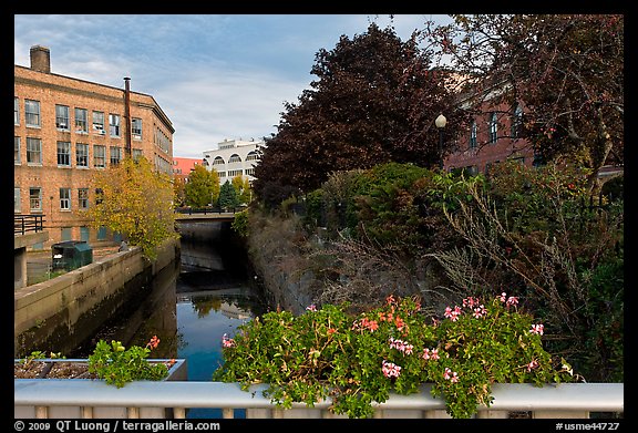 Bridge with flowers over the Kenduskeag stream. Bangor, Maine, USA