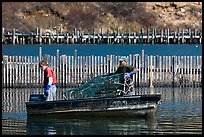 Lobstermen hauling traps. Stonington, Maine, USA