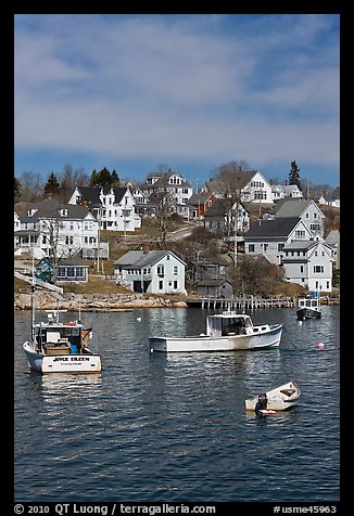 Lobster boats and houses on hillside. Stonington, Maine, USA (color)