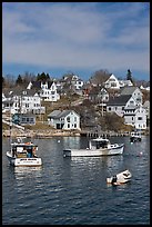 Lobster boats and houses on hillside. Stonington, Maine, USA