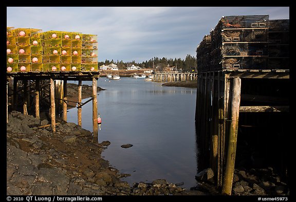 Lobster traps framing harbor. Corea, Maine, USA