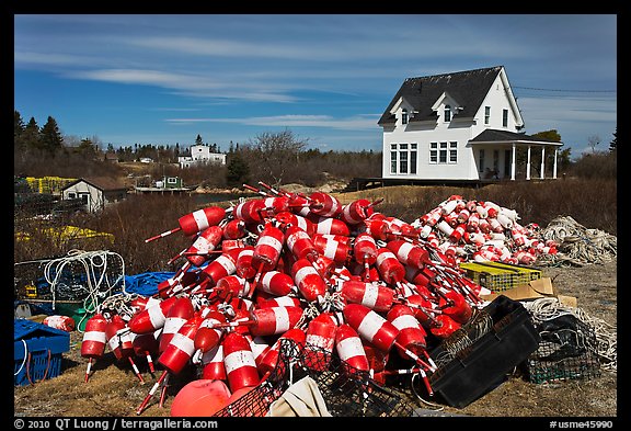 Buoys and house. Corea, Maine, USA