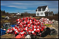 Buoys and house. Corea, Maine, USA (color)