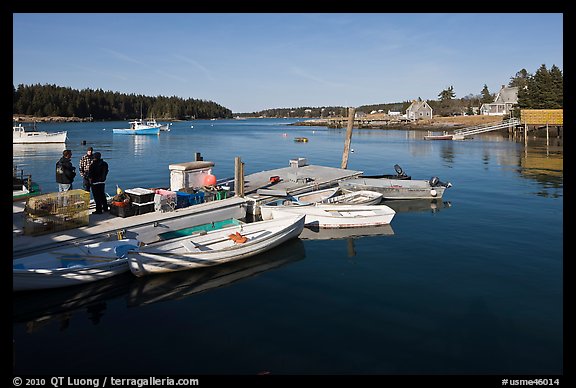 Small boats, harbor and village. Isle Au Haut, Maine, USA (color)