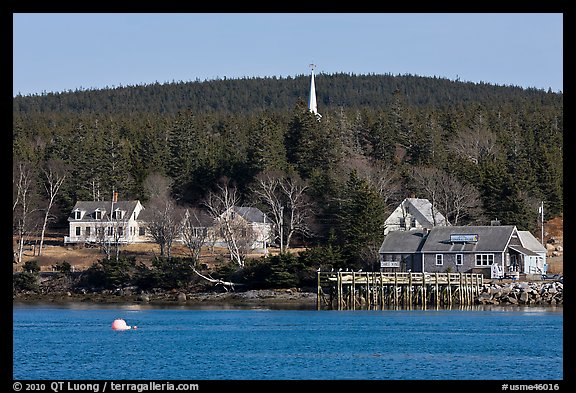 General store and church steeple. Isle Au Haut, Maine, USA (color)