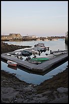 Small boats and harbor at sunset. Stonington, Maine, USA (color)