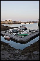 Small boats and harbor at sunset. Stonington, Maine, USA