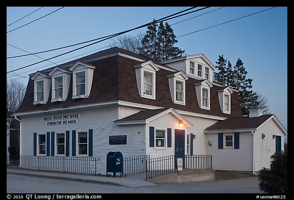 Post office in federal style at dusk. Stonington, Maine, USA (color)