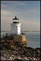 Bug Light with boy running. Portland, Maine, USA