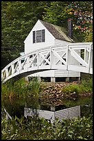 House and arched bridge. Maine, USA