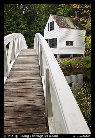 White wooden bridged and house. Maine, USA